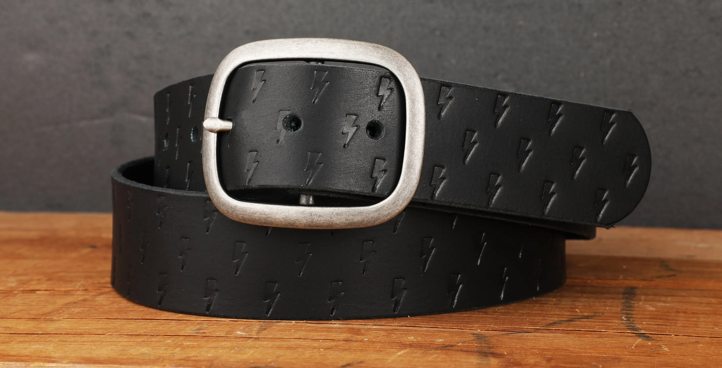 Black Leather Belt with Embossed Lightning Bolts and Antique Silver Buckle